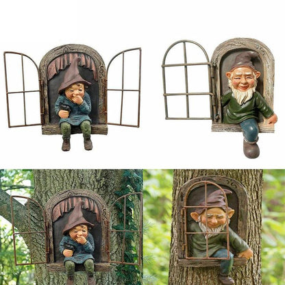 Garden gnomes and fairies ornament in window